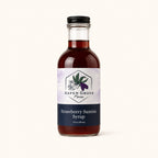 Strawberry Sunrise Syrup by Aspen Grove Farm — studio product photograph